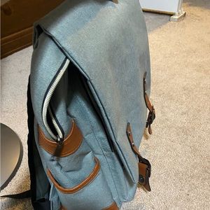Backpack - many compartments inside, great for highschool or college